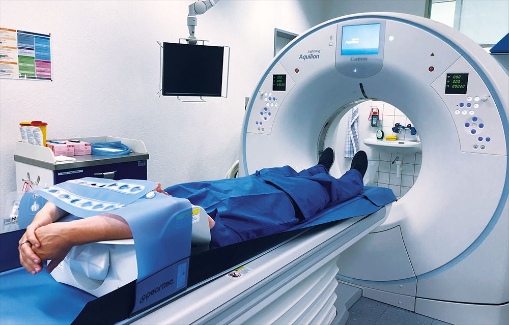 Arms-over-head positioning for thoracic/abdominal examination using ProBelt on the Aquilion Lightning.